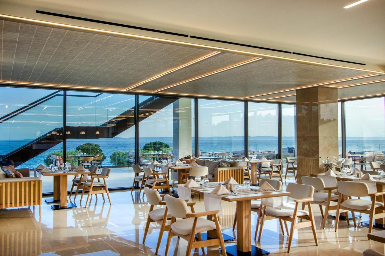 Ammoa Luxury Hotel & Spa Resort Nikíti Eksteriør bilde The restaurant