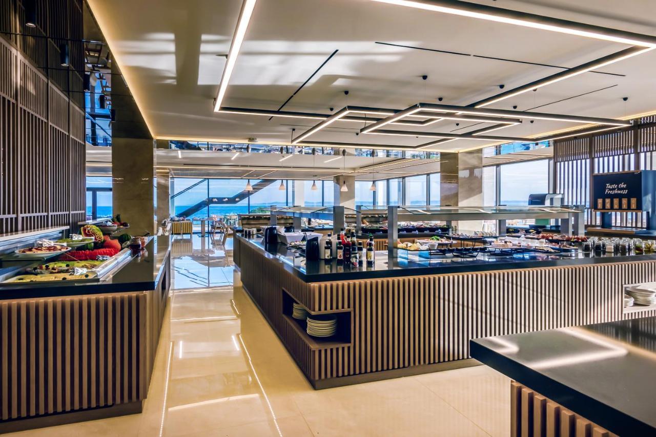 Ammoa Luxury Hotel & Spa Resort Nikíti Eksteriør bilde The buffet at the 101 lounge