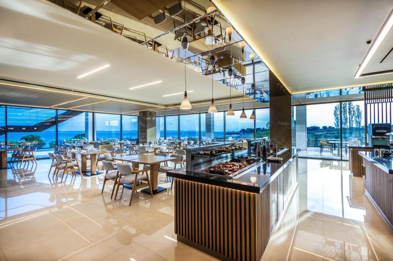 Ammoa Luxury Hotel & Spa Resort Nikíti Eksteriør bilde The restaurant