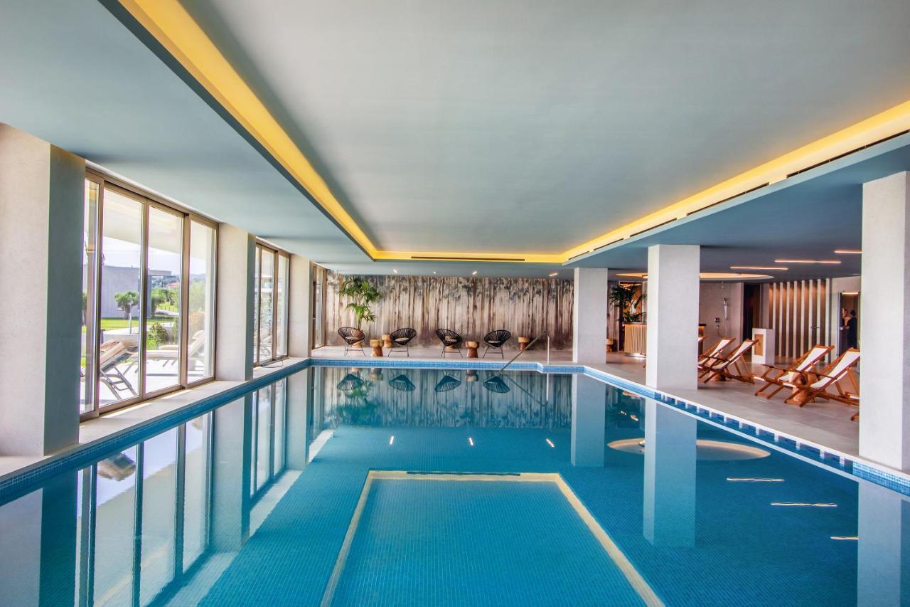 Ammoa Luxury Hotel & Spa Resort Nikíti Eksteriør bilde The swimming pool at the hotel