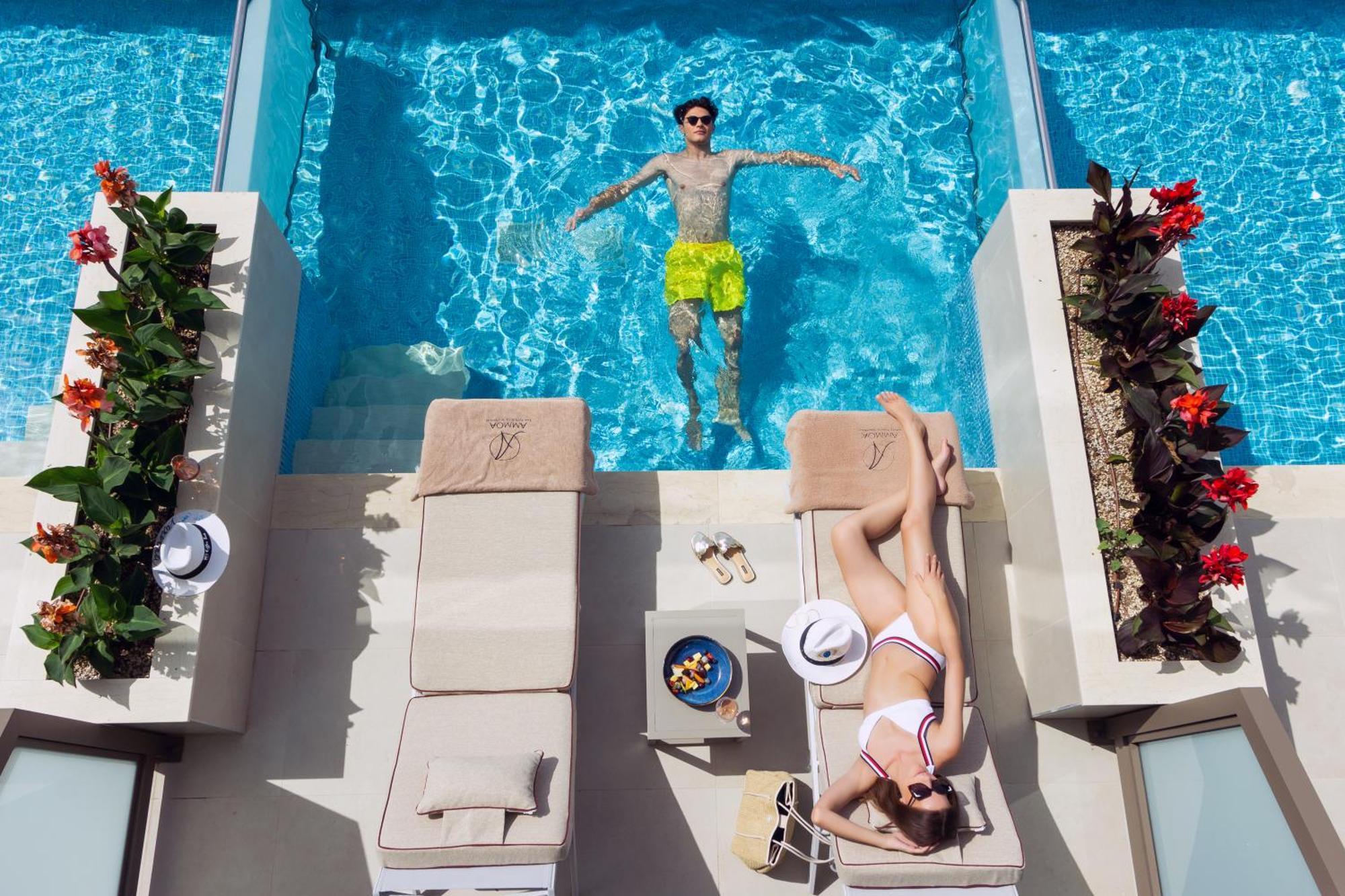 Ammoa Luxury Hotel & Spa Resort Nikíti Eksteriør bilde The pool at the W South Beach